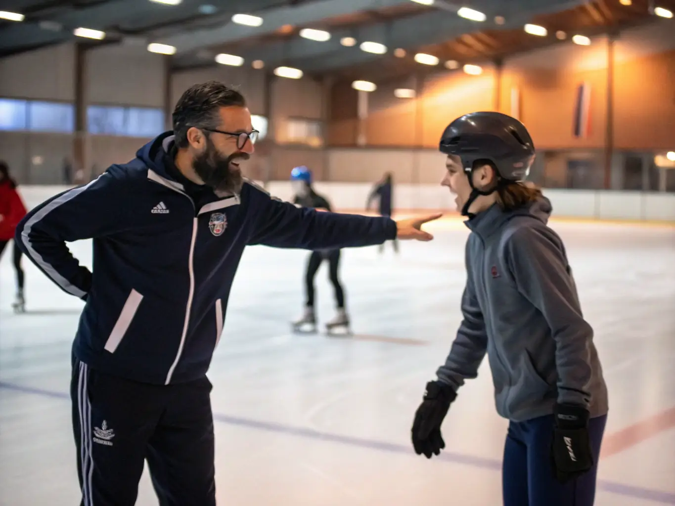 A coach providing personalized instruction to an artistic roller skater at Union Sportive de Mazères Lezons, emphasizing the importance of guidance and skill refinement.